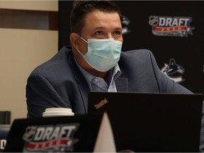 Todd Harvey in the Canucks' draft room during the 2020 NHL Entry Draft, which was conducted over Zoom.