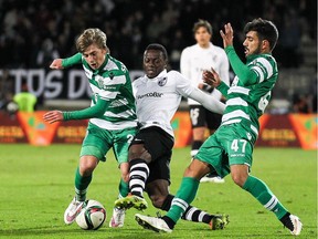 Ryan Gauld, left, has officially signed with the Vancouver Whitecaps. The Scottish midfielder was one of the best at his position in Portgual's Primeira Liga for Farense.