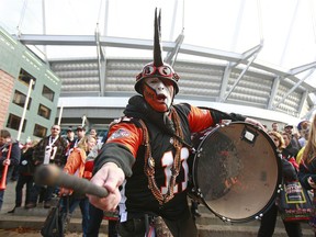 A fan works the crowd prior to the start of the CFL 99th Grey Cup between the B.C. Lions and the Winnipeg Blue Bombers November 27, 2011 at B.C. Place