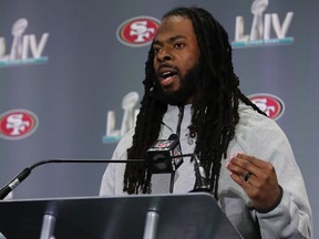 Richard Sherman of the San Francisco 49ers speaks to the media prior to Super Bowl LIV at the James L. Knight Center on January 29, 2020 in Miami, Florida.