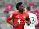 Alphonso Davies in action for Bayern Munich in a May 2020 German Bundesliga match in Munich.