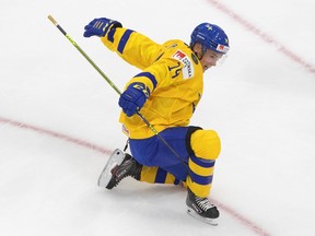 Sweden’s Arvid Costmar celebrates a goal against Russia at the world juniors in Edmonton last December. ‘I’m just trying to compete as hard as I can every shift and be the guy you don’t want to play against,’ he says.