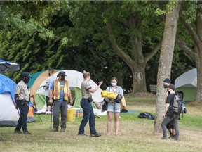 Homeless campers at Crab Park in Vancouver are being told to leave Friday, July 8, 2021. Several have left on their own but more than two dozen remain.