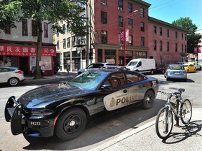 Vancouver police on scene at the London Hotel on E. Georgia St. on Tuesday.