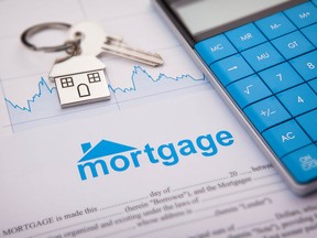 An empty mortgage application form with house key