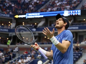 Andy Murray of United Kingdom reacts against Stefanos Tsitsipas of Greece during their men's singles first round match on Day One of the 2021 US Open at the Billie Jean King National Tennis Center on August 30, 2021 in the Flushing neighborhood of the Queens borough of New York City.
