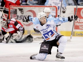 Jeff Ulmer, as a member of the Hamburg Freezers in Germany, celebrates after scoring a goal in March 2006. ‘I think I got a good feel for almost every hockey-playing country, especially the ones I played in,’ says the newly hired assistant coach of the AHL’s Abbotsford Canucks.