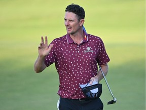 England's Justin Rose smiles on the 18th after his second round on day 2 of The 149th British Open Golf Championship at Royal St George's.