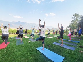 BC wineries take tourism to new levels with a wide variety of creative ways to celebrate, learn and relax, such as yoga at Baillie-Groham Estate Winery in Creston. BAILLIE-GROHMAN ESTATE WINERY