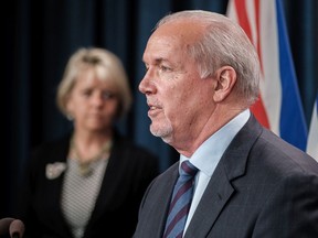 File photo of Premier John Horgan, and Provincial Health Officer Dr. Bonnie Henry.