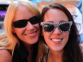 Kathy Collins with her daughter, Emily (right).