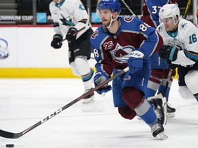 Then-Colorado Avalanche defenceman Kyle Burroughs leads the rush during a game last May against the San Jose Sharks in Denver, Colo. Burroughs dressed in five games for the Avs during the most recent, shortened season, averaging 10:05 of ice time per game and picking up one assist.