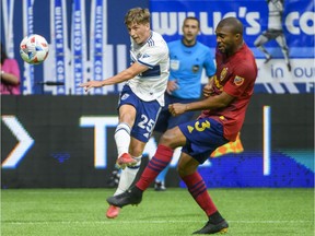 Whitecaps star midfielder Ryan Gauld, pictured on the left against Real Salt Lake last season, might miss a second straight game this weekend with a hamstring injury.