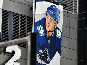 Jake Virtanen banner remains on Rogers Arena on Aug. 17 after the Vancouver Canucks released the player following sexual assault allegations.
