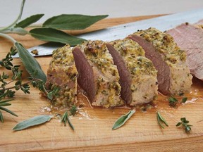 Oven-baked pork tenderloin from Culinary Herbs: Grow. Preserve. Cook! by Ontario herb specialist Yvonne Tremblay.