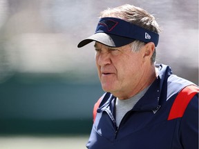 EAST RUTHERFORD, NEW JERSEY - SEPTEMBER 19: Head coach Bill Belichick of the New England Patriots looks on before the game against the New York Jets at MetLife Stadium on September 19, 2021 in East Rutherford, New Jersey.