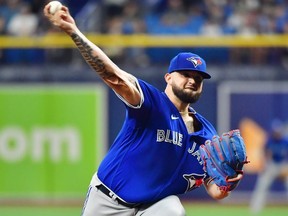 Alek Manoah of the Toronto Blue Jays delivers a pitch to the Tampa Bay Rays in the first inning at Tropicana Field on September 21, 2021 in St Petersburg, Florida.