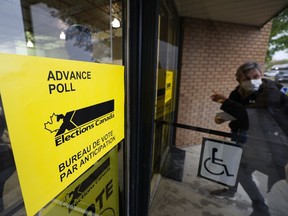 Saskatoon residents arrive right at 9 a.m. to cast their vote at one of the advance polls for the federal election. Photo taken in Saskatoon on Friday, September 10, 2021.