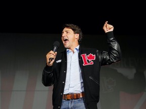 Canada's Liberal Prime Minister Justin Trudeau speaks at a drive-in rally during his election campaign tour in Oakville, Ontario Canada September 12, 2021.
