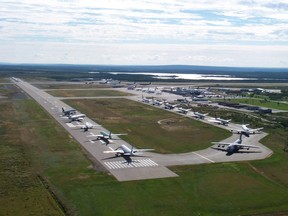 In this photo taken on Sept. 11, 2001, commercial jets are pictured at Gander Airport after the airspace over the United States and Canada were closed after the September 11th terrorist attacks and pilots were forced to land there.
