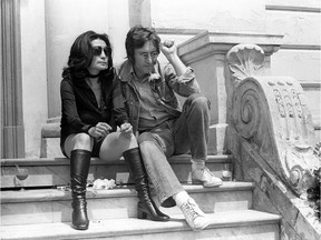 In this file photo taken on May 17, 1971 Music legend John Lennon and his wife Yoko Ono pose for photographers in Cannes.