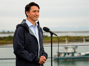 Canada's Liberal Prime Minister Justin Trudeau looks on during an election campaign stop in Richmond, British Columbia Canada September 14, 2021.