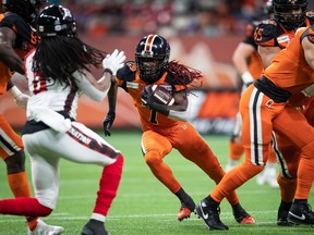 B.C. Lions receiver Lucky Whitehead carries the ball against the Ottawa Redblacks during the first half of their Canadian Football League game at B.C. Place Stadium on Sept. 11, 2021.