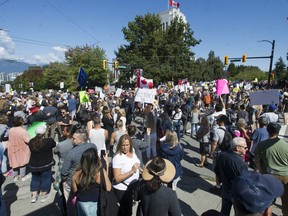 Several thousand anti-vaccine protestors converge on Vancouver General Hospital and City Hall as part of the World Wide Walkout for Health Freedom