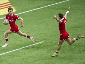 Canada's Brennig Prevost (left) is all clear to score in action against Germany during the HSBC World Rugby Sevens series in Vancouver, BC Saturday, September 18, 2021.