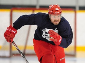 Wade MacLeod digs in during his regular workout at Planet Ice Coquitam this week. ‘If I go back and I don’t have what I once had, that’s fine,’ the multiple cancer survivor says of his return to professional hockey with the England-based Manchester Storm. ‘But I feel like I’m fit and ready to go and my skills are there.’