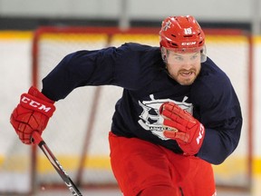 Wade MacLeod digs in during his regular workout at Planet Ice Coquitam this week. ‘If I go back and I don’t have what I once had, that’s fine,’ the multiple cancer survivor says of his return to professional hockey with the England-based Manchester Storm. ‘But I feel like I’m fit and ready to go and my skills are there.’