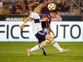 Vancouver Whitecaps FC defender Florian Jungwirth (26) defends on Colorado Rapids defender Lucas Esteves (66) at Dick's Sporting Goods Park.