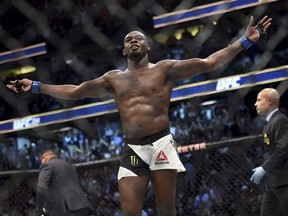 Jon Jones reacts after knocking out Daniel Cormier during UFC 214 in Anaheim, Calif., Saturday July, 29, 2017.