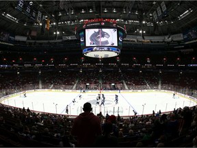 Fans return to Rogers Arena for the first time since March 2020 as the Vancouver Canucks and Winnipeg Jets face off during their preseason NHL game at Rogers Arena on October 3, 2021 in Vancouver, British Columbia, Canada.