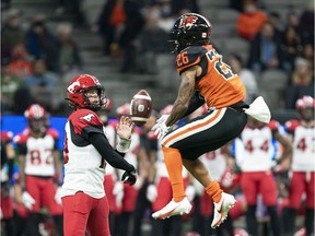 Austin Joyner #26 of the B.C. Lions knocks down the pass of quarterback Bo Levi Mitchell #19 of the Calgary Stampeders Calgary Stampeders during the first half of CFL football action at B.C. Place on Saturday.