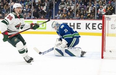 VANCOUVER, BC - OCTOBER 26: Mats Zuccarello #36 of the Minnesota Wild scores a goal on goalie Thatcher Demko #35 of the Vancouver Canucks during the first period of NHL action on October, 26, 2021 at Rogers Arena in Vancouver, British Columbia, Canada.