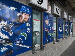 VANCOUVER, BC - JANUARY 27: A notice of closure due to Covid-19 is taped to the ticket window at Rogers Arena, home of the Vancouver Canucks on January 27, 2021 in Vancouver, Canada. (Photo by Rich Lam/Getty Images) ORG XMIT: 775608045 [PNG Merlin Archive]