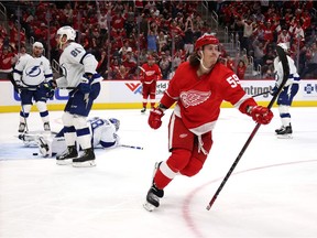Tyler Bertuzzi #59 of the Detroit Red Wings celebrates his second period goal against the Tampa Bay Lightning at Little Caesars Arena on October 14, 2021 in Detroit, Michigan.