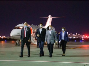 Prime Minister Justin Trudeau welcomes Michael Kovrig and Michael Spavor back to Canada at the Calgary airport.