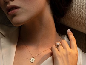 A model wears jewelry from the brand Vrai.