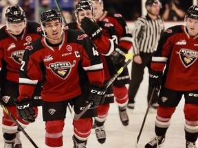 Vancouver Giants captain Justin Sourdif celebrates a goal Friday night with a few of his closest friends.  Sourdif had one goal and two assists in a 6-4 win over Prince George.