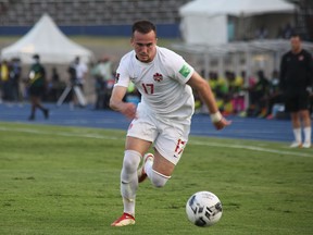 Canada midfielder Liam Millar chases down a ball during a FIFA World Cup Qualifier against Jamaica in Kingston, Jamaica on Oct. 10, 2021.