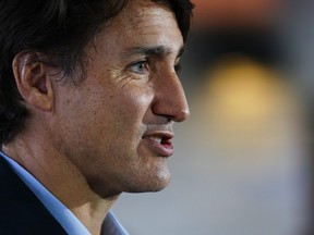 Prime Minister Justin Trudeau speaks during a press conference as he visits the Children's Hospital of Eastern Ontario in Ottawa on Thursday, Oct. 21, 2021.