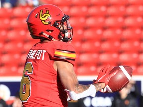 Dino's Tyson Philpot catches a pass and runs his third touchdown of the game during the second half of action as the Calgary Dino's defeat the visiting UBC Thunderbirds 53-14 at McMahon Stadium. Saturday, Oct. 30, 2021.