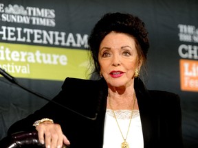 Joan Collins attends the Cheltenham Literature Festival in Cheltenham, England, on Oct. 16, 2021.