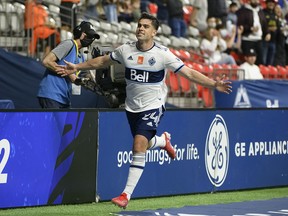 Whitecaps forward Brian White celebrates his first goal against San Jose Earthquakes during the first half at B.C. Place Saturday.