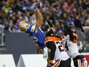 Winnipeg Blue Bombers WR Kenny Lawler goes up for a touchdown catch against the B.C. Lions at IG Field in Winnipeg on Sat., Oct. 23, 2021.