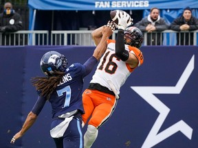 B.C. Lions wide receiver Bryan Burnham (16) makes a touchdown catch as he is defended by Toronto Argonauts defensive back Jalen Collins (7) on Saturday at BMO Field.
