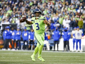 Seattle Seahawks quarterback Russell Wilson (3) passes against the Los Angeles Rams during the second quarter at Lumen Field.