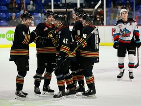 The Vancouver Giants, including Fabian Lysell (far left, #11) celebrate a goal on Friday, Oct. 29, 2021, in a 7-2 win over the Kelowna Rockets at the Langley Events Centre. Lysell scored once and added three assists in the victory.
